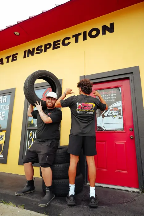 Master Lube — the crew: team portrait outside the shop