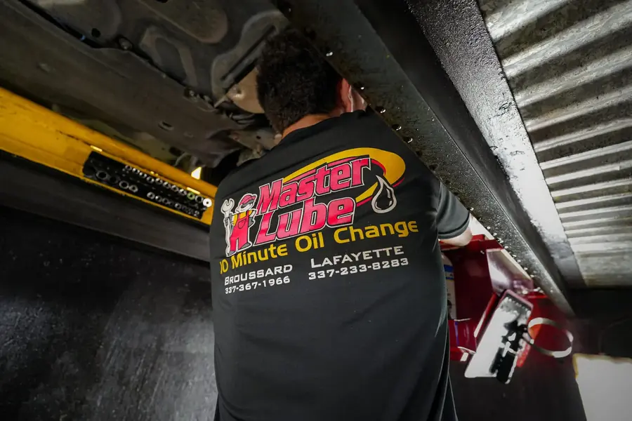 Master Lube — under the lift: low-angle action